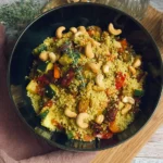 Zitroniger-Couscous-mit-gerostetem-Gemuse-und-Cashews-Rezept